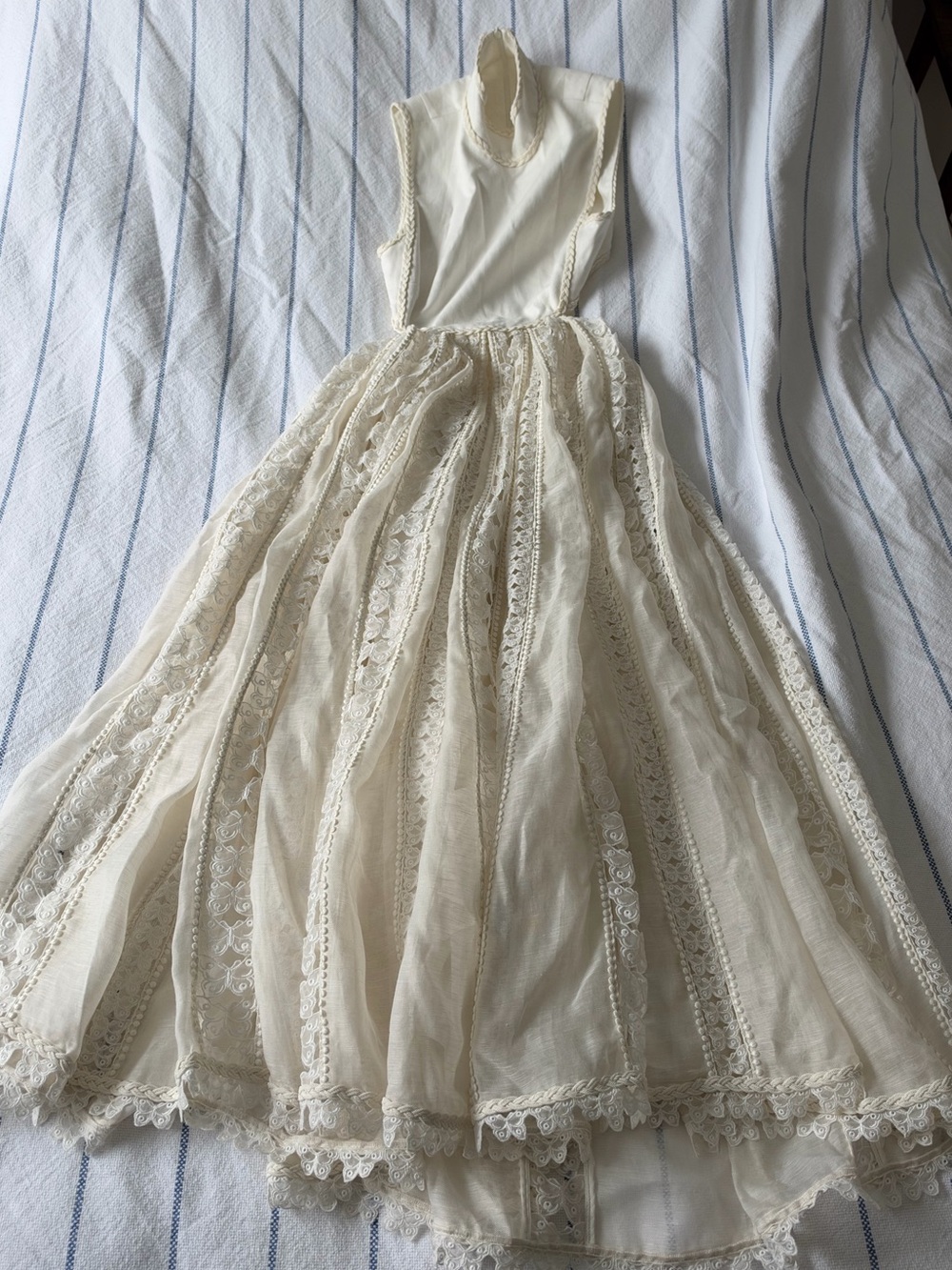 Zimmermann Mock Neck dress in Ivory Size S. Embroidery detail and open back.